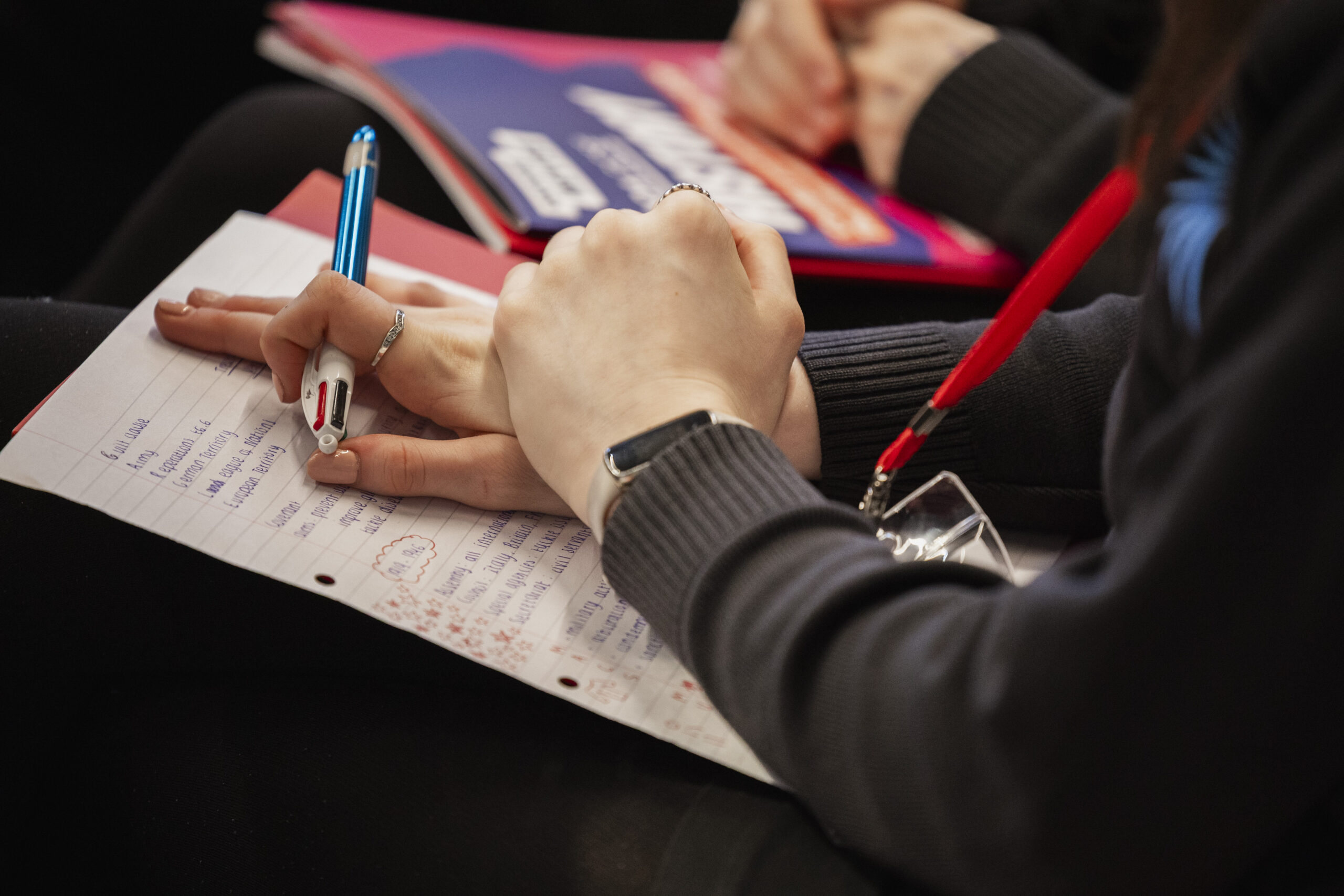 Close up of students hands at Oxford Revise GCSE History study day